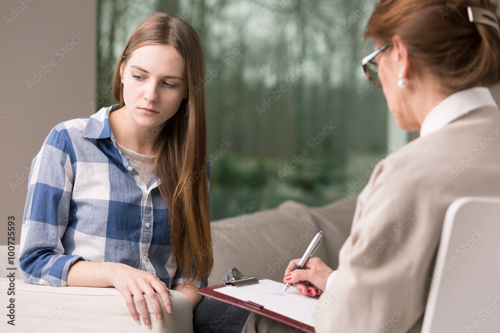 Teenager and psychotherapist Teenager and psychotherapist
