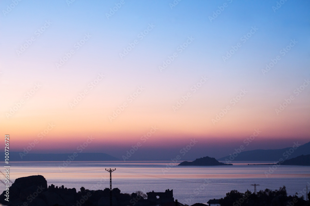 The harmony of colors of the sunset./  Magnificent colors and magical views gives us the sun on the beach in Turkey.