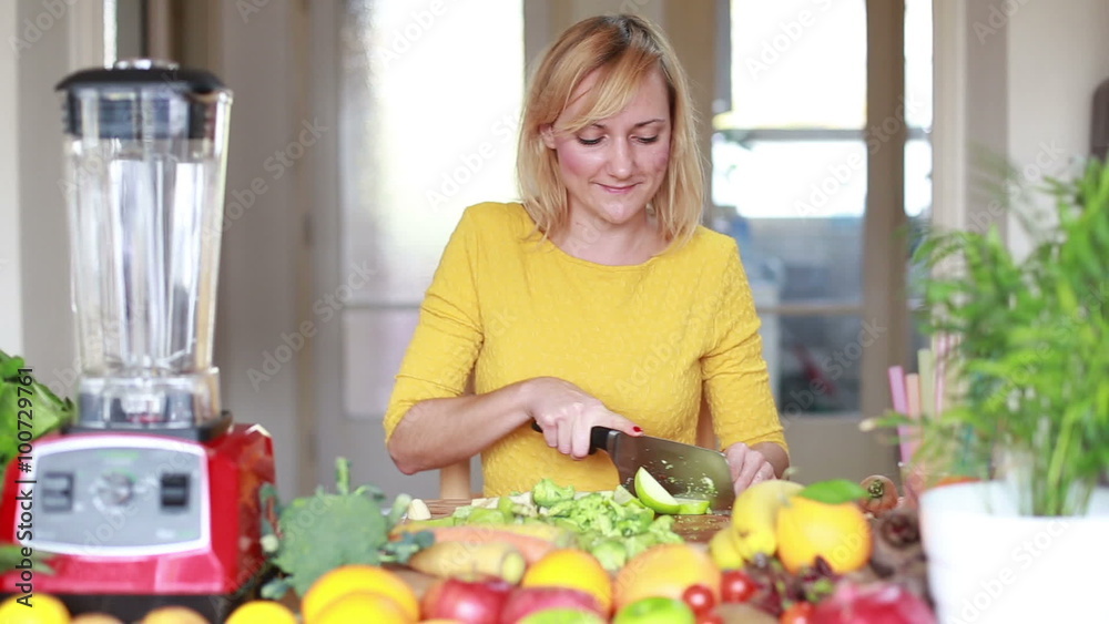 Young woman cutting apple into slices Young woman cutting apple into slices