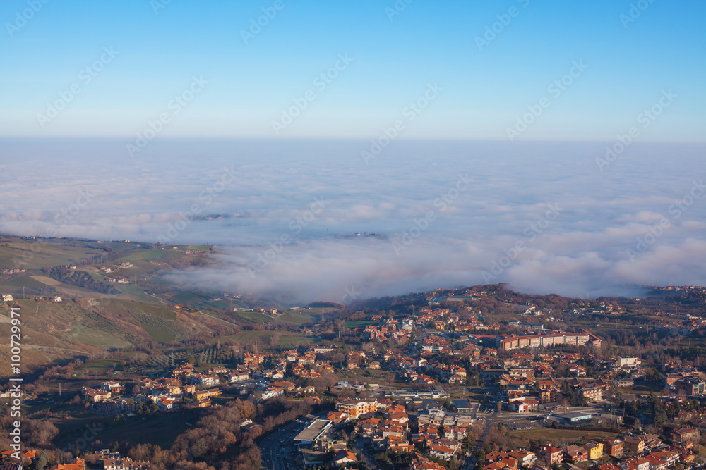 The valley and the city in the mist.