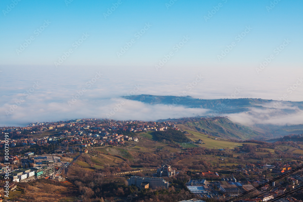 The valley and the city in the mist.