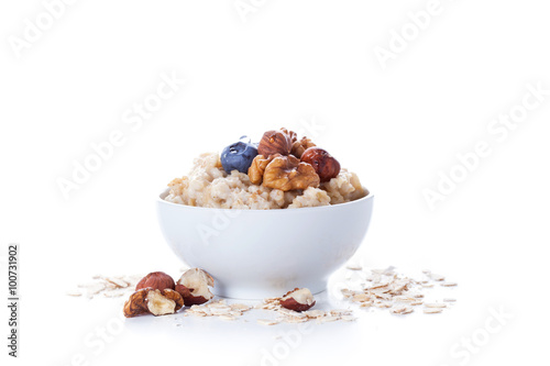 Oatmeal porridge in bowl photo