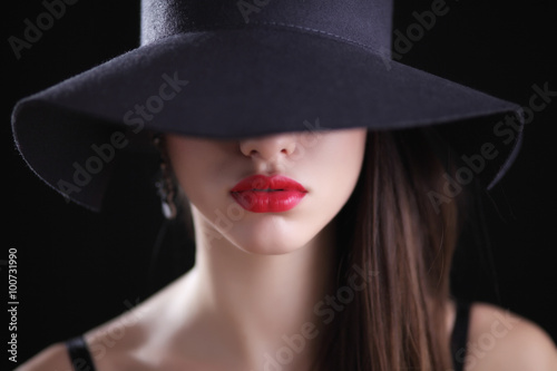 Young woman in hat © Andre Ila
