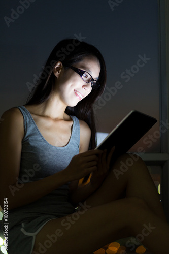 Woman use of the tablet pc at home