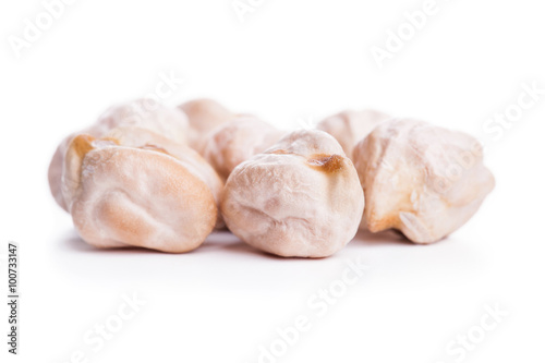 Raw dry chickpeas on white background