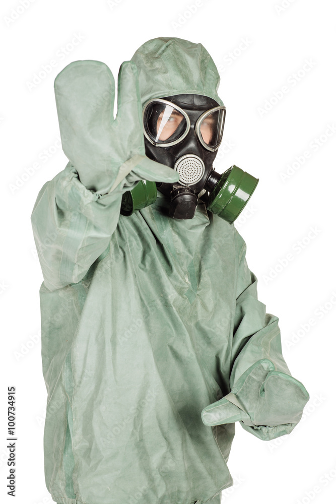 Man with protective mask and protective clothes signaling a stop Man with protective mask and protective clothes signaling a stop