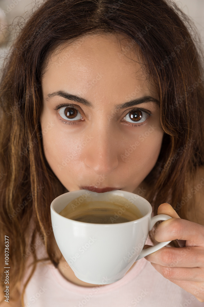 Woman having a cup of coffee Woman having a cup of coffee