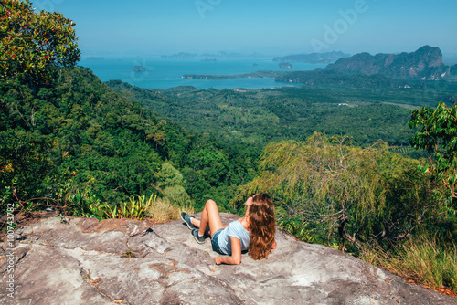 Girl on the view poinf of the mountain, Tab Kak Hang Nak Nature Trail, Thailand photo