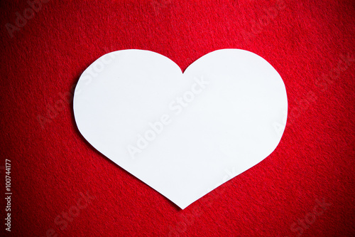 Red background with white heart without text on valentine's day.