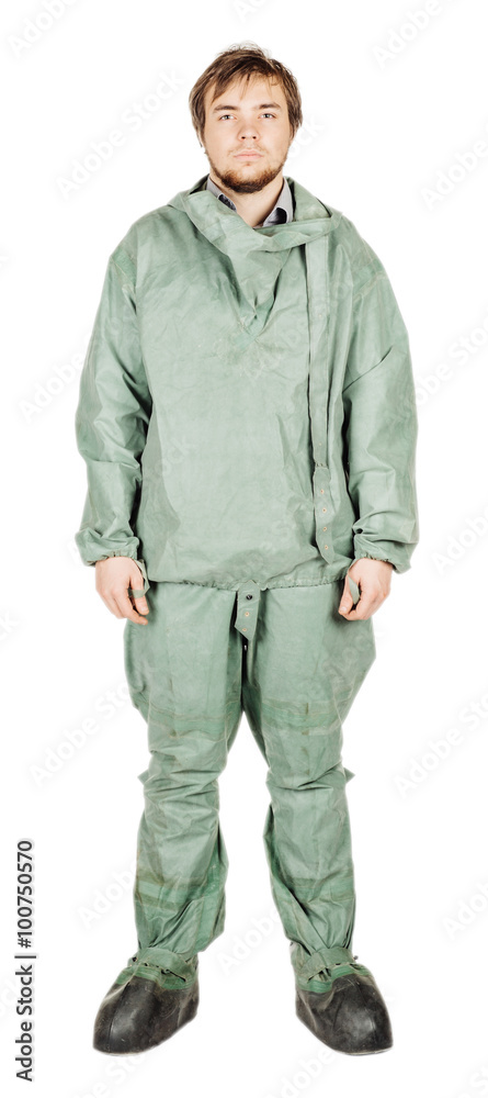 Man with protective mask and protective clothes standing on whit Man with protective mask and protective clothes standing on whit