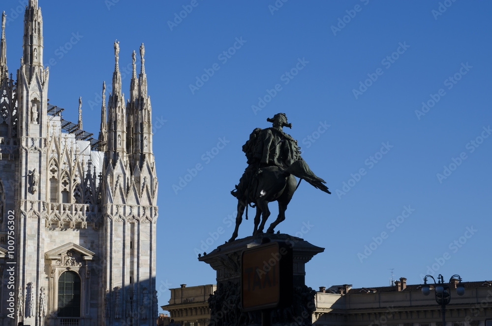 milan a glimpse of the beautiful cathedral city with a statue in