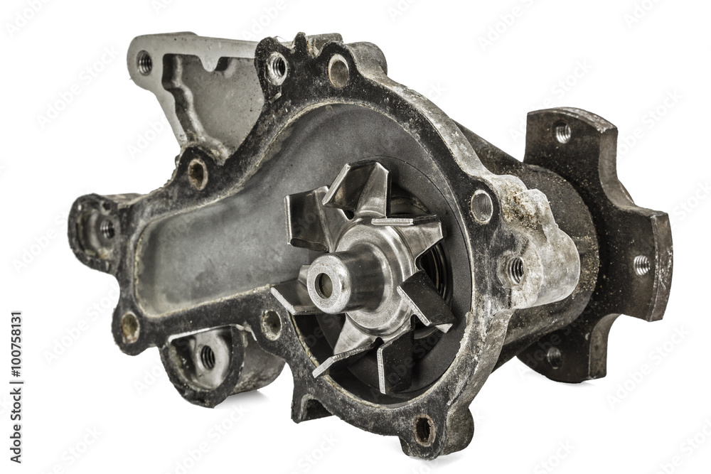 Old pump of the engine cooling system car, isolated on white Old pump of the engine cooling system car, isolated on white
