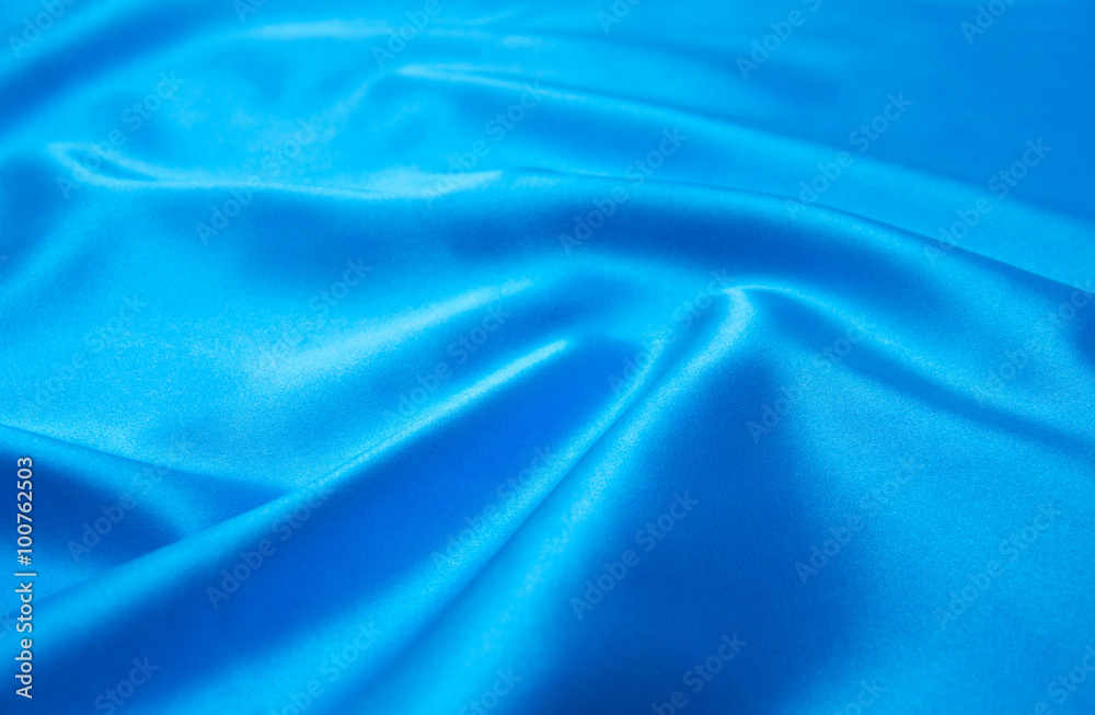 Fototapeta premium Smooth elegant blue silk can use as background