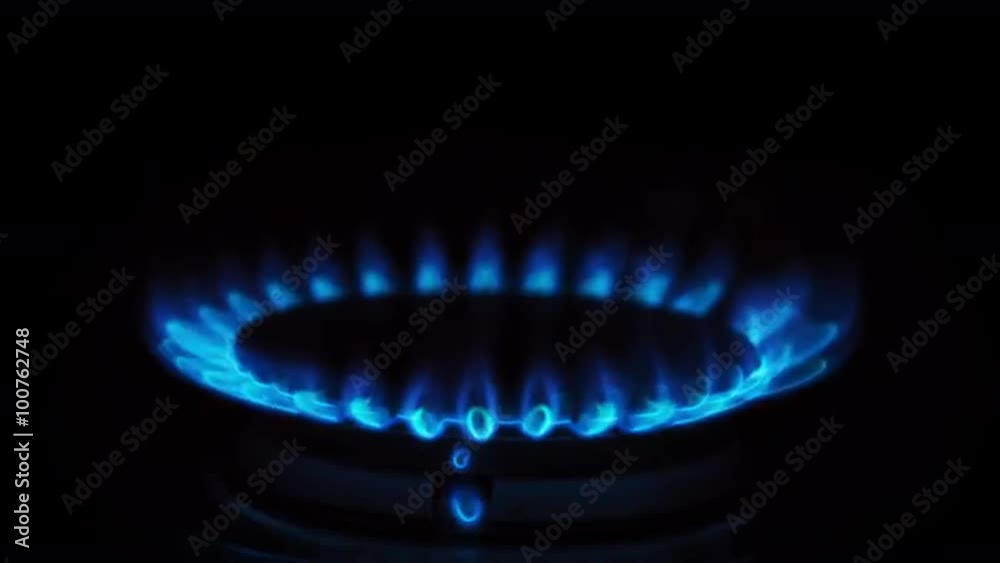 Gas Stove Burner Lighting Close Up Center. a close up shot of a gas burner on a stove being lit. audio included
Gas Stove Burner Lighting Close Up Center. a close up shot of a gas burner on a stove being lit. audio included