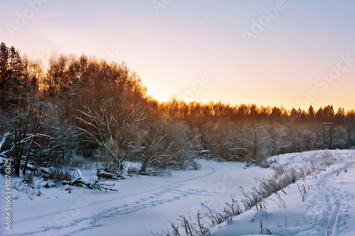 Sunset in winter field