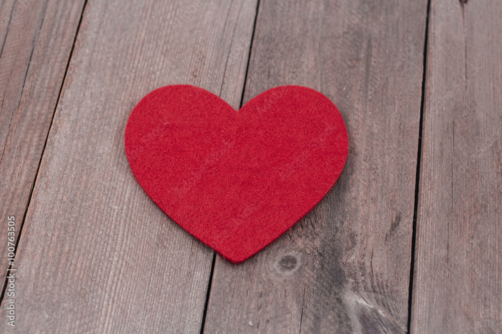 Valentine’s heart on rustic wooden texture background Valentine’s heart on rustic wooden texture background