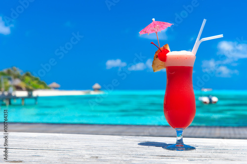 cocktail with blur beach on background