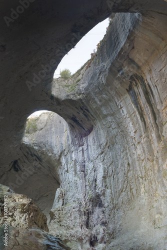 Prohodna is a karst cave in north central Bulgaria, next to the Karlukovo village