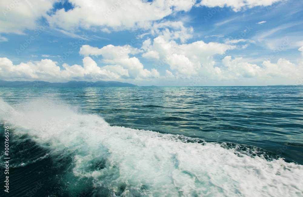 wave on sea and blue sky with clouds and sun wave on sea and blue sky with clouds and sun