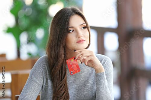 Young woman trying to use b...