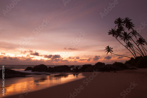 Tropical beach on sunset