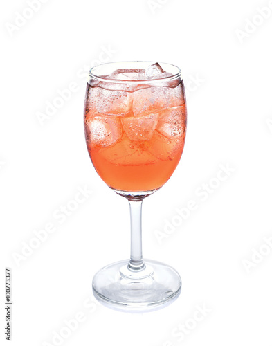 a glass of pomegranate juice on white background