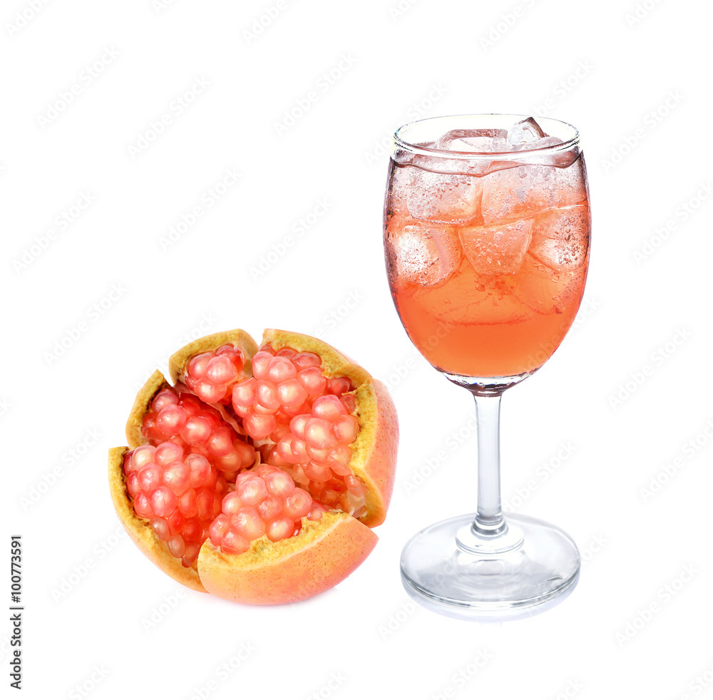 a glass of pomegranate juice on white background a glass of pomegranate juice on white background
