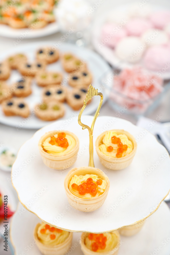 Set of cold snacks, canape and dessert, closeup Set of cold snacks, canape and dessert, closeup