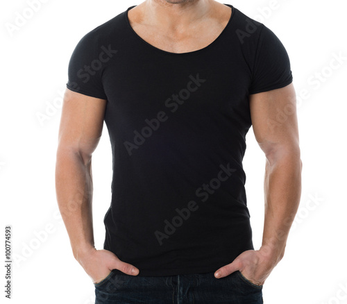 Man In Black Tshirt Standing Against White Background