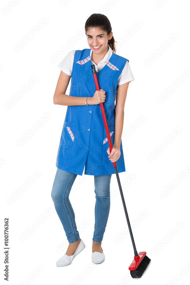 Happy Female Janitor Sweeping On White Background Happy Female Janitor Sweeping On White Background
