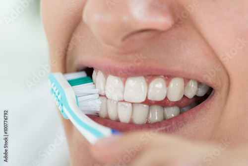 Woman Brushing Teeth