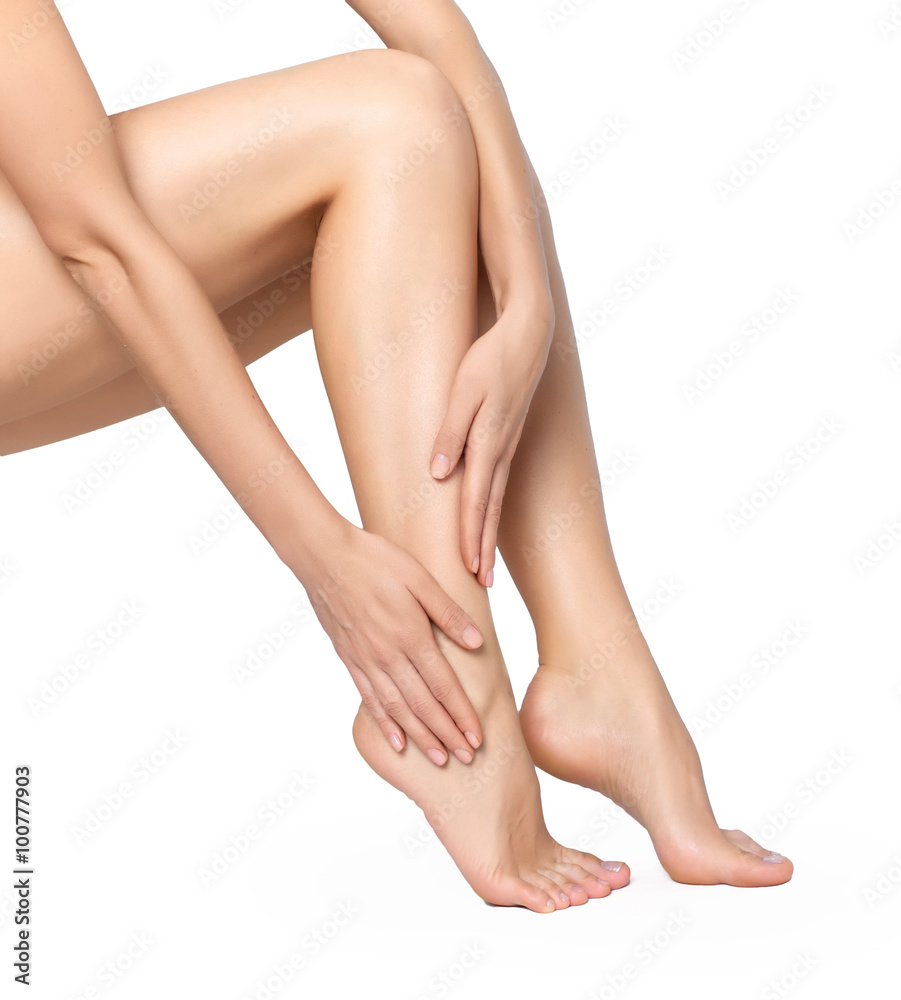 woman legs isolated on white. Depilation or another healths concept woman legs isolated on white. Depilation or another healths concept