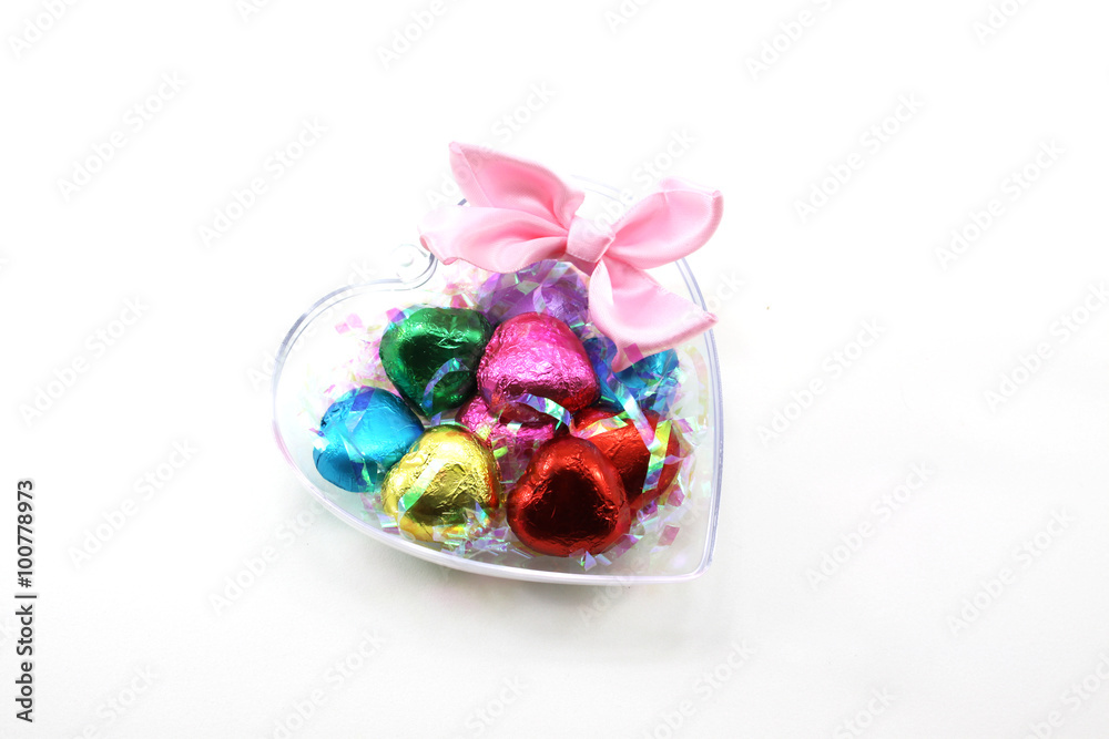 Chocolate hearts candies on white background Chocolate hearts candies on white background