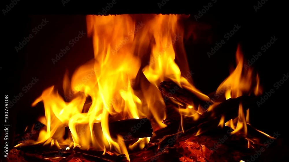 Fire in fireplace. Closeup of firewood burning in fire Fire in fireplace. Closeup of firewood burning in fire