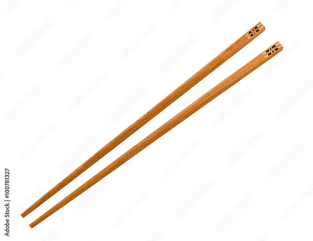 Wooden pairs of chopsticks on white background Wooden pairs of chopsticks on white background