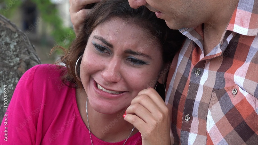Woman Crying On Man?s Shoulders