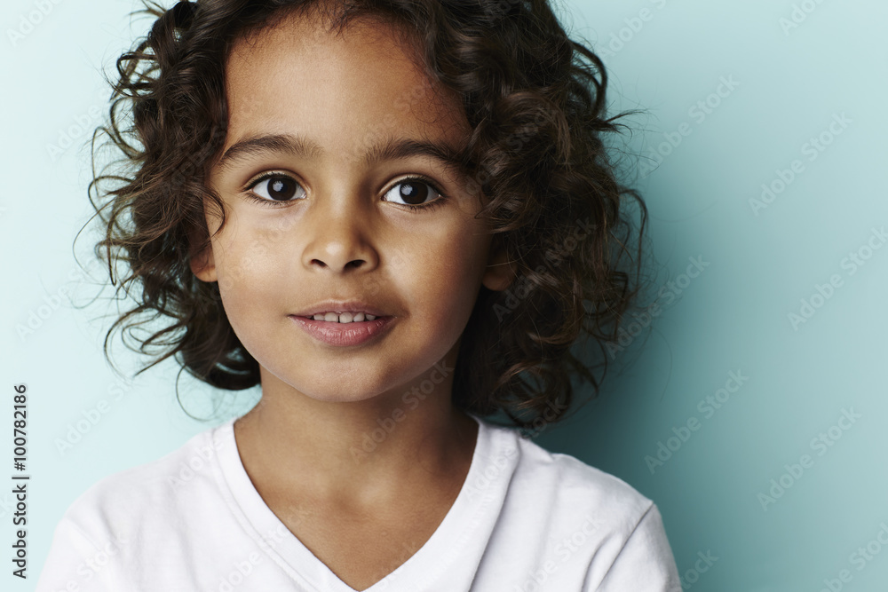 Young boy on blue background, portrait Young boy on blue background, portrait