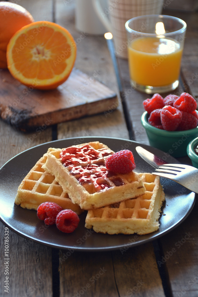 plate of waffles with raspberry marmalade