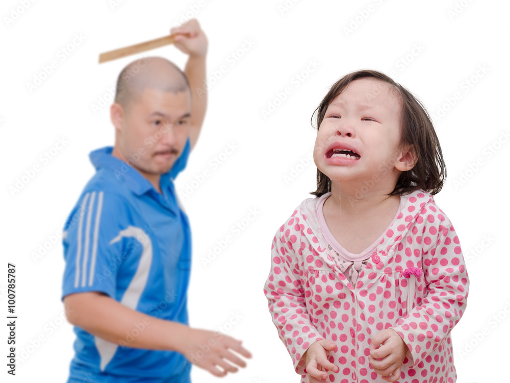 Little Asian girl crying while her dad hitting by ruler Little Asian girl crying while her dad hitting by ruler