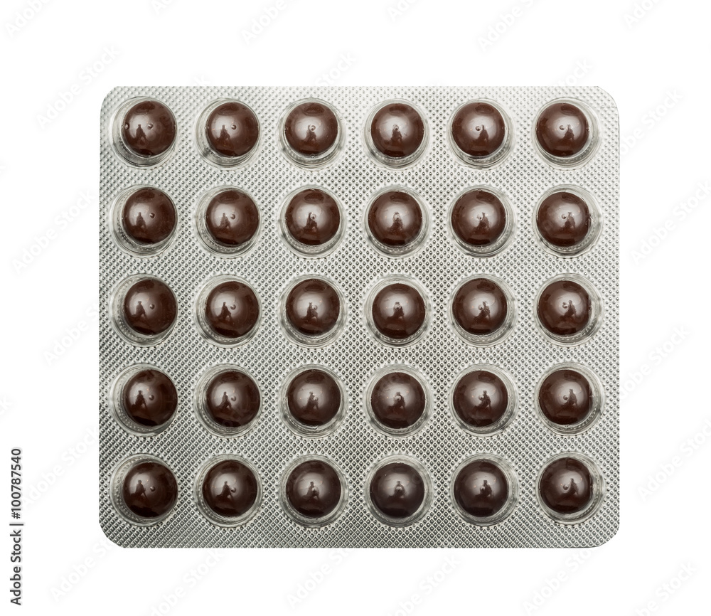 Pack of brown pills, tablets, capsules isolated on white background Pack of brown pills, tablets, capsules isolated on white background