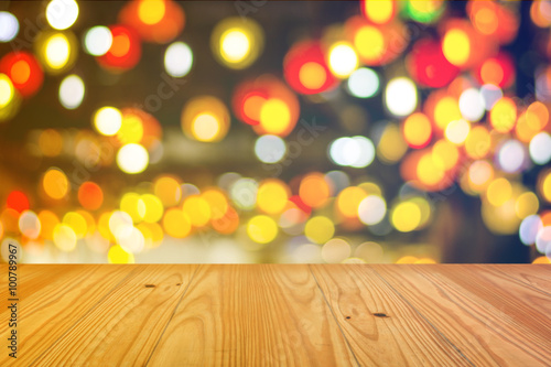 Wood table in front of bokeh background