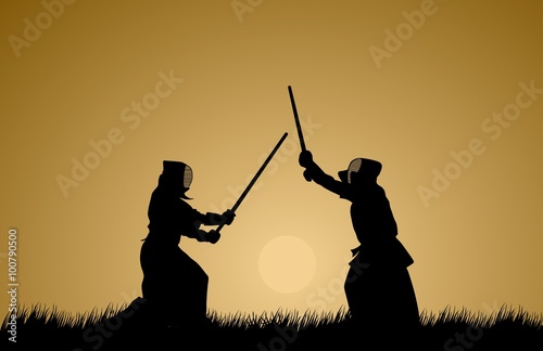 Two men engage in martial arts.