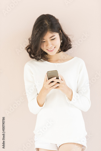 asian woman using smartphone