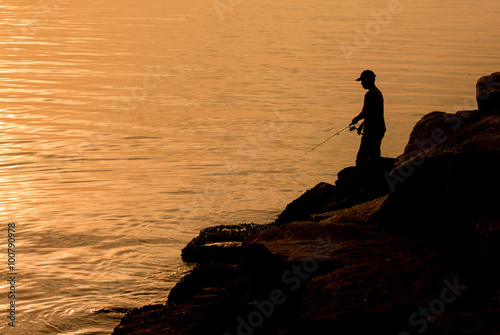Man fishing at sea