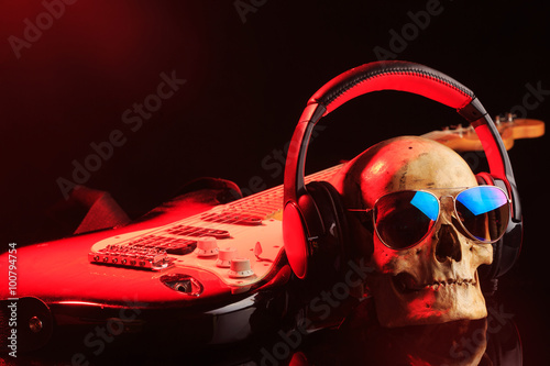 Still life with skull and electric guitar photo
