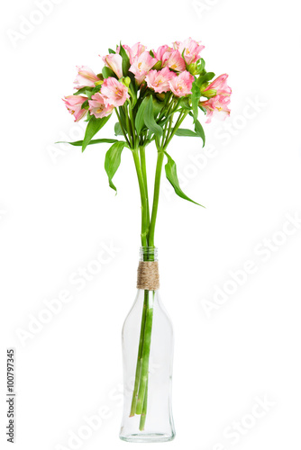 bouquet of pink alstroemeria in glass vase