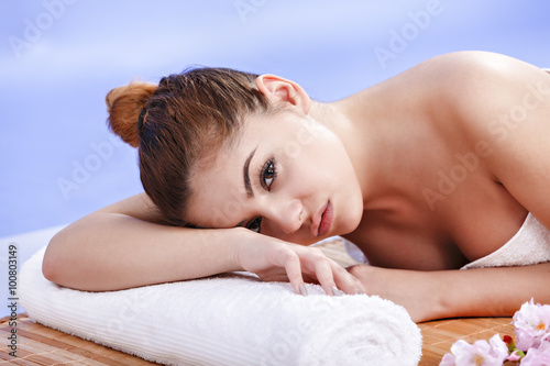 beautiful Asian woman relaxes at the spa