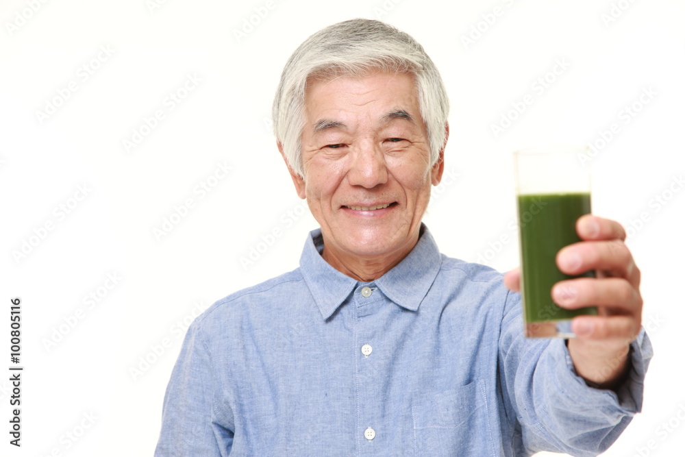 senior Japanese man with green vegetable juice senior Japanese man with green vegetable juice