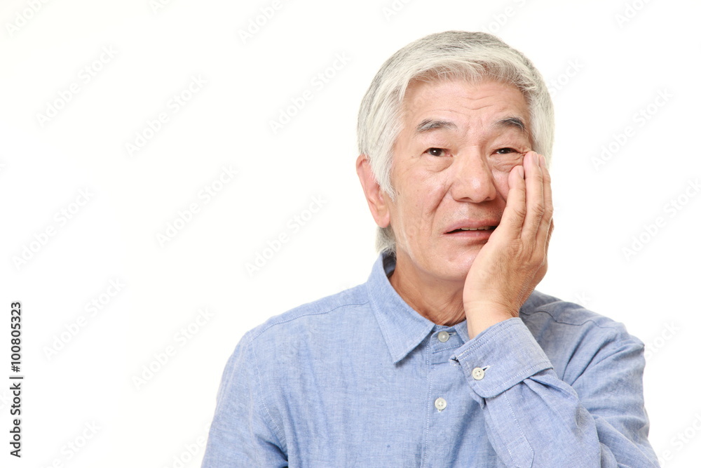 senior Japanese man suffers from toothache senior Japanese man suffers from toothache