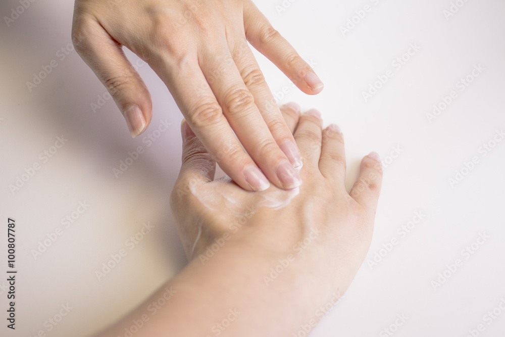 Woman hands with cream